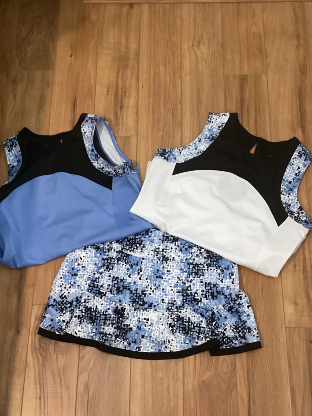 Bolle tennis-Blue, White and Black Colorblock.
skirt with 2 tops.  NWOT